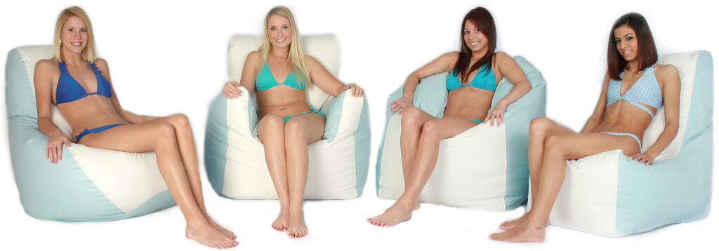 four women in bikinis relax and smile on ocean-tamer waterproof bean bags, showing comfort and support for marine environments. marine bean bag