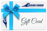 As a boat owner, I see a white gift card with blue ribbon, Ocean-Tamer Marine Bean Bags logos, and "Gift Card" for marine seating. marine bean bag